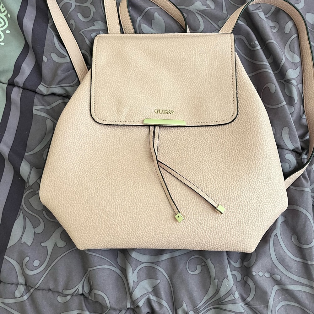 Guess varsity pop women's backpack pvc snap and drawstring closure in pale pink